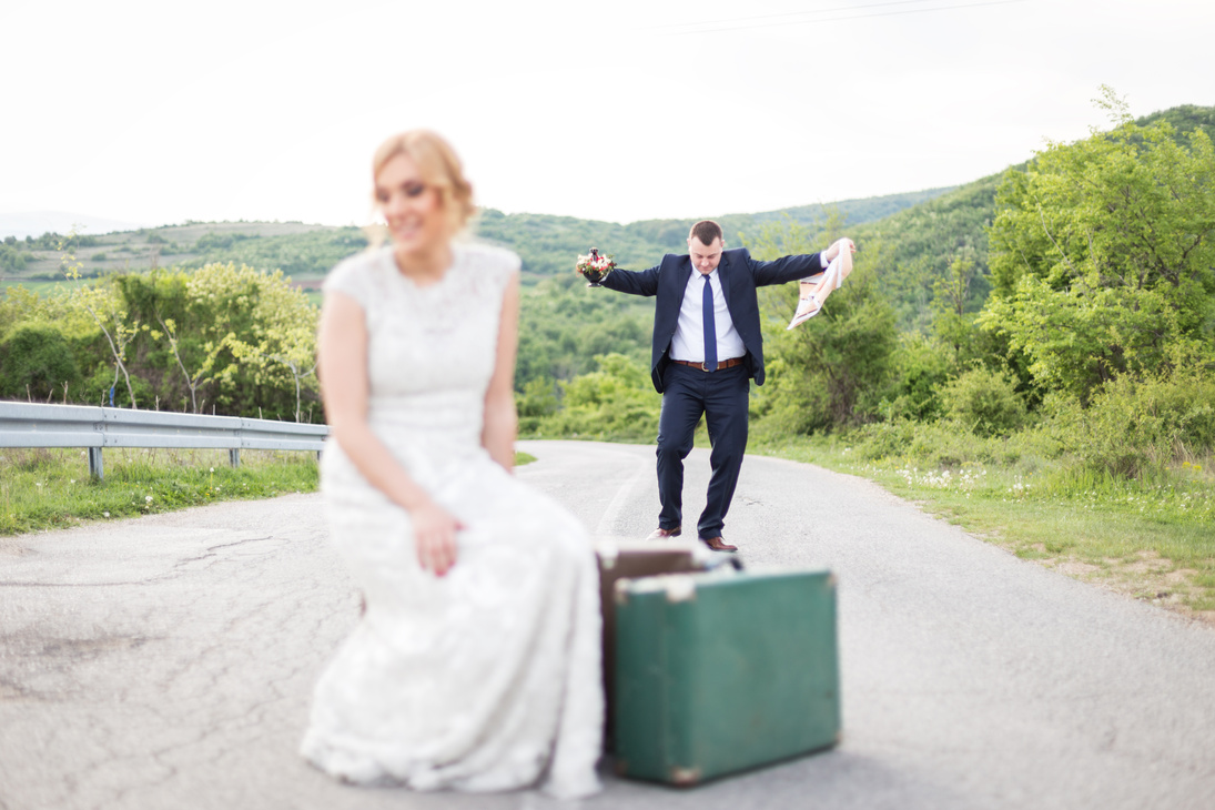 Groom celebrating trip to honeymoon
